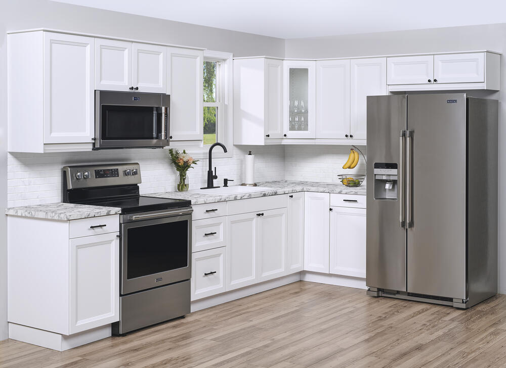 Clever Storage Solutions for Compact Kitchens: Embracing L-Shaped Cabinets